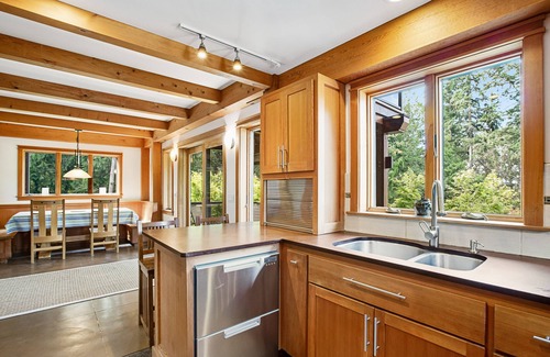 Bainbridge Island House | Eco home & studio with swim spa, Olympic views, home gym, & play structure