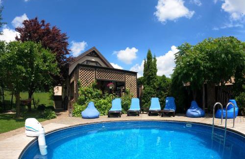 Lesniki House | Eco-House PERI with a pool and in the garden near Kyiv