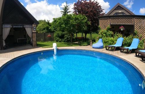 Lesniki House | Eco-House PERI with a pool and in the garden near Kyiv
