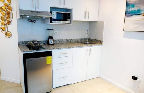 Las Penas Apartment | Ecuabook Edificio Riverfront II Piso 9 - Suite 911-2 con Acceso Área Social