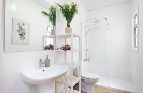 San Isidro Apartment | Eden Rentals 103 Surfy Stylish BedandCoffee Room
