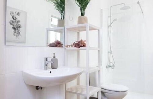 San Isidro Apartment | Eden Rentals 103 Surfy Stylish BedandCoffee Room