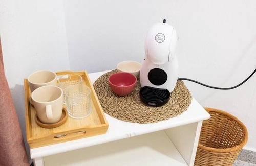 San Isidro Apartment | Eden Rentals 105 Surfy Stylish BedandCoffee Room