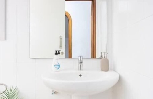 San Isidro Apartment | Eden Rentals 105 Surfy Stylish BedandCoffee Room