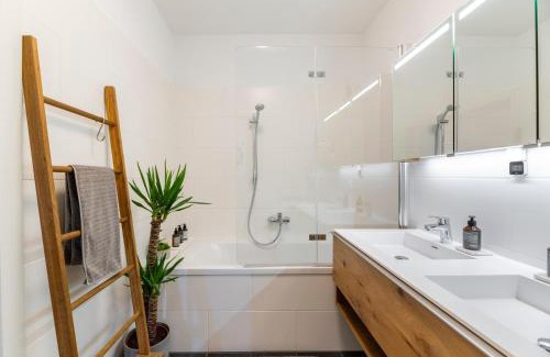Graz-Straßgang Apartment | EDLER WOHNRAUM Panoramablick 3 SZ Boxspringbetten, E-Ladestation, Kaffeevollautomat, Klima, Lift, Terrasse & 2xTG