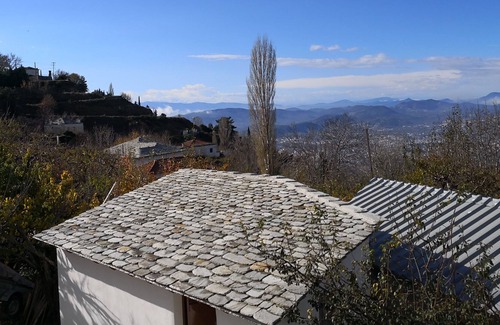 Portaria House | Effrosini Traditional home , with garden view and fireplace