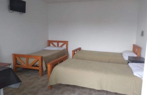 Comandante Luis Piedrabuena Apartment | El Mastil Departamentos Dormis Habitaciones