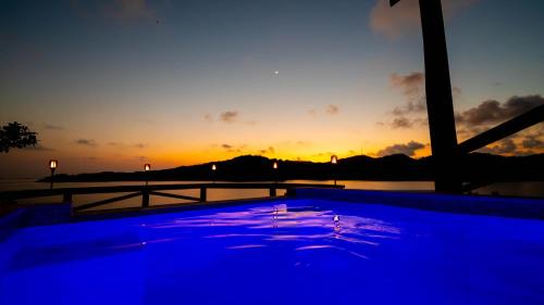 Punta Caribe Apartment | El Palacio Rosa on Blue Lagoon 3BR Beachfront Suite on pristine & quiet bay w incredible views