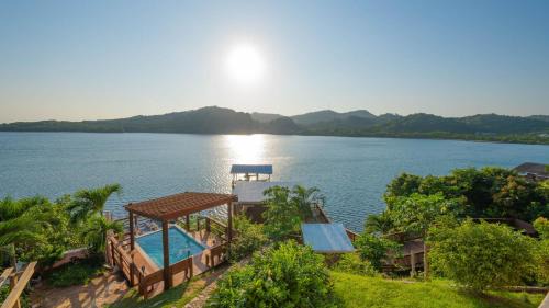 Punta Caribe Apartment | El Palacio Rosa on Blue Lagoon 3BR Beachfront Suite on pristine & quiet bay w incredible views