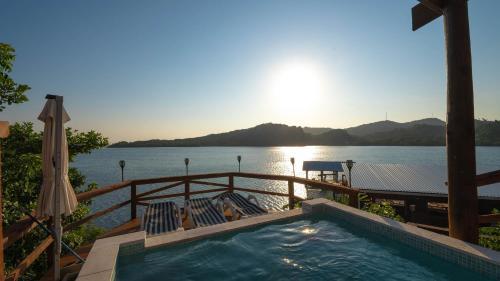 Punta Caribe Apartment | El Palacio Rosa on Blue Lagoon 2BR Beachfront Suite on pristine & quiet bay w incredible views
