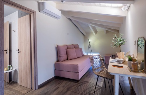 Kerameikos House | Elaia Athens Boutique themed with the Olive Tree.