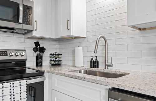 Royal Oak Apartment | Elegant 1BR Upper Suite | Renovated King Bedroom