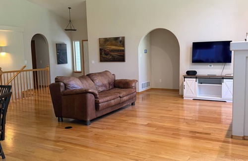 Rathdrum House | Elegant 4-bedroom Golf Course Retreat with Private Beach Access