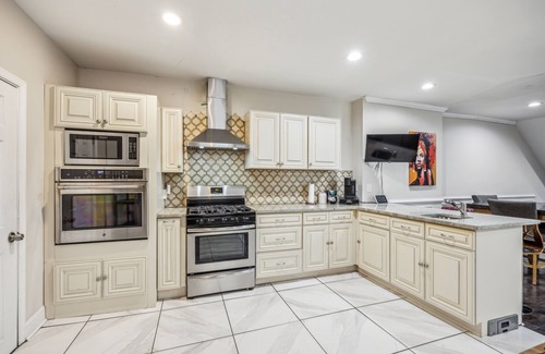 West Philadelphia House | Elegant 5BR Townhome in Prime Location by RedAwning