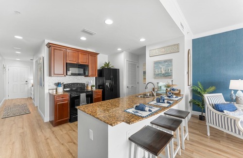 Upper Grand Lagoon Condo | Elegant Bayfront Condo | Massive Pool and Hot Tub
