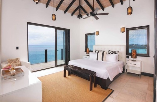 Fryes Beach Hotel | Elegant Beach-View Villa with Pool Perfect for Families Seeking Relaxation