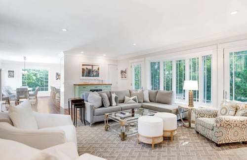 Water Mill House | Elegant Coastal Escape with Expansive Yard, Heated Pool, and Outdoor.