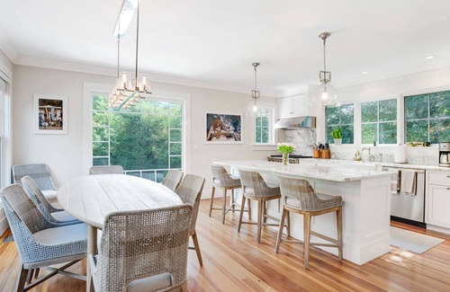 Water Mill House | Elegant Coastal Escape with Expansive Yard, Heated Pool, and Outdoor.