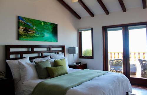 Avalon Villa | Elegant Condo W Hot Tub & Patio