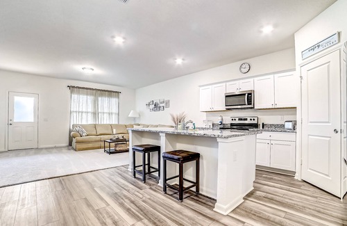Medina Valley House | Elegant dog-friendly house with pool & playground access, patio, W/D, & AC