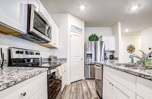 Medina Valley House | Elegant dog-friendly house with pool & playground access, patio, W/D, & AC