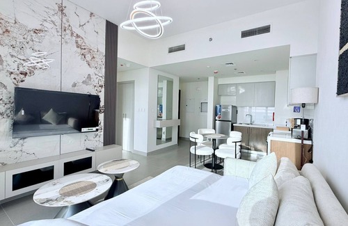 Jadaf Apartment | Elegant Downtown Escape 1BR w/Balcony, Pool & GYM