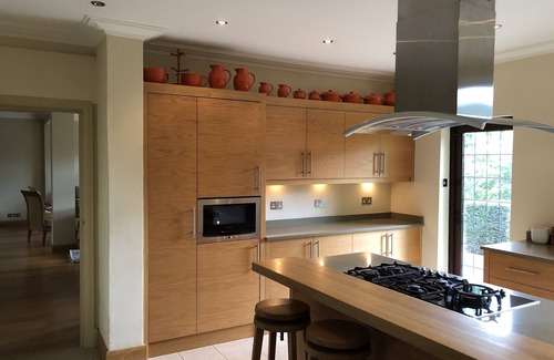 Stoke Poges Villa | Elegant family home backing into a Golf Course .