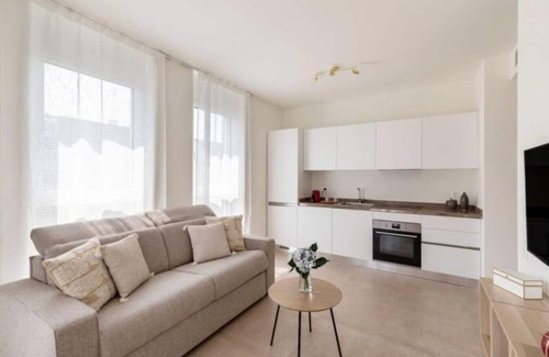 Lugano Apartment | Elegant new Apt with AC, private balcony & garage