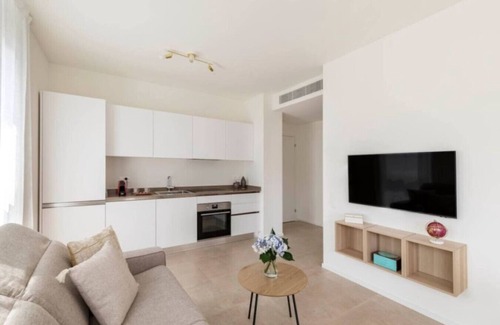 Lugano Apartment | Elegant new Apt with AC, private balcony & garage