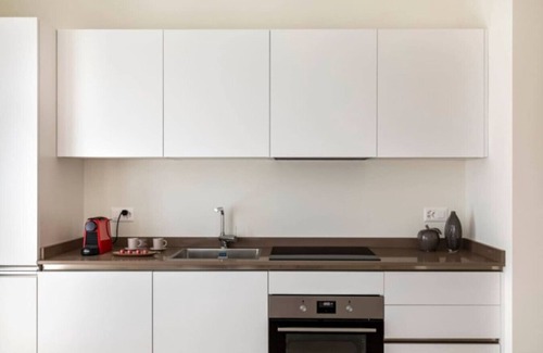 Lugano Apartment | Elegant new Apt with AC, private balcony & garage