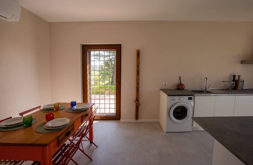 Belvedere Ostrense Apartment | Elegant new house with garden, veranda and shared pool