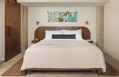 East Bank Hotel | Elegant Retreat with Cozy Corners, Handmade Touches, Rooftop Loungers