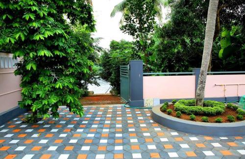 North Paravur Villa | Elegant River Front Villa Near Airport Kochi.