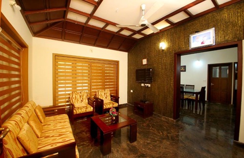 Veliyathunadu House | Elegant River Front Villa