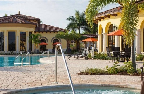 Gran Paradiso House | Elegant Sunny Florida Vacation Home in Resort Style Community