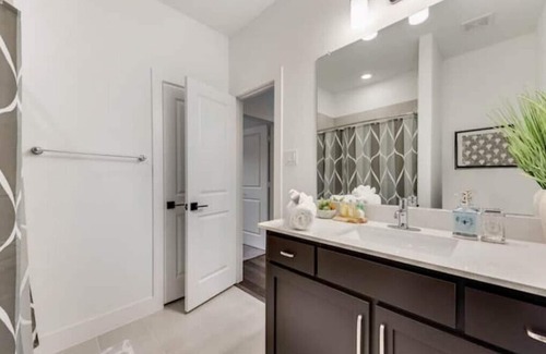 Lewisville House | Elegant Tech Oasis | Uplift Desk | TSLA Charger