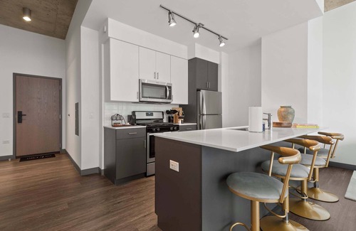 The Loop Apartment | Elevated 2BR Retreat + Balcony with Bean Views