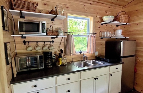 Canterbury Cabin | Elevated cabin nestled among the trees, and the Saint John River. Pet friendly.n