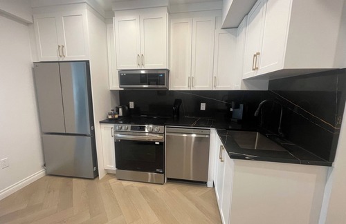 Southeast Calgary House | Elite Guest Walkout Basement Suite Retreat! Perfect for Family