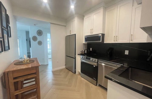 Southeast Calgary House | Elite Guest Walkout Basement Suite Retreat! Perfect for Family
