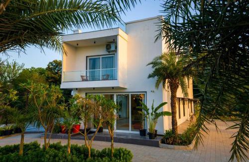 Bhiwadi Villa | ELIVAAS AdhiVa 5-BHK Farmhouse with Private Pool, Bar & Lush Garden