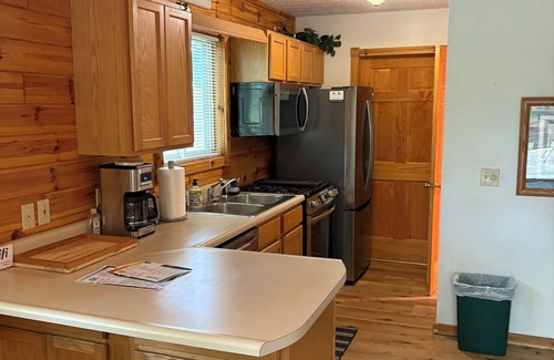 Hillman Ski Chalet | Elk Ridge at Thunder Bay Golf Resort Chalet. Pet friendly/Hot Tub/Golf Views