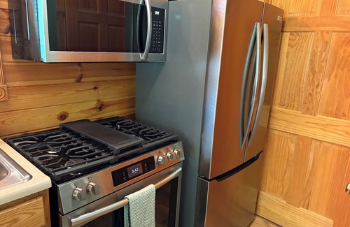 Hillman Ski Chalet | Elk Ridge at Thunder Bay Golf Resort Chalet. Pet friendly/Hot Tub/Golf Views
