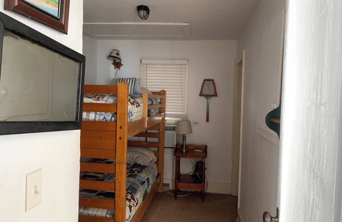 Tawas City Cabin | Ella’s Escape Located on Lake Huron and it is Pet Friendly!