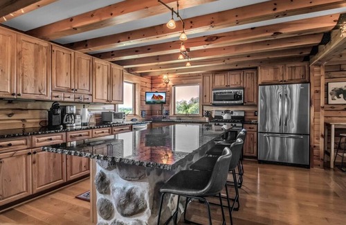 Farmersville Station Cabin | Ellicottville Cabin w/hot tub, stocked pond & 150+ acres of land to explore!