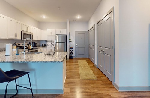 Coliseum Central Apartment | Ellipse Urban Hampton: Luxury Living with Resort Pool and Pet Spa