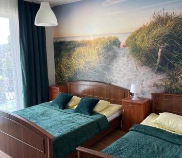 Ostrowo House | Emada- Pokoje Gościnne i Studia