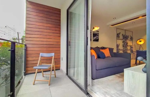 Colonia Roma Apartment | Embrace the Now: 203 Industrial's Sunlit Serenity Awaits