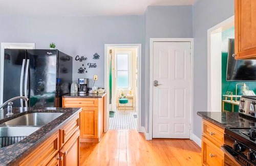 Tremont House | Emerald Oasis: Cozy Tremont 1BR Lower Unit by Christmas Story House | Parking 7 Min to Downtown