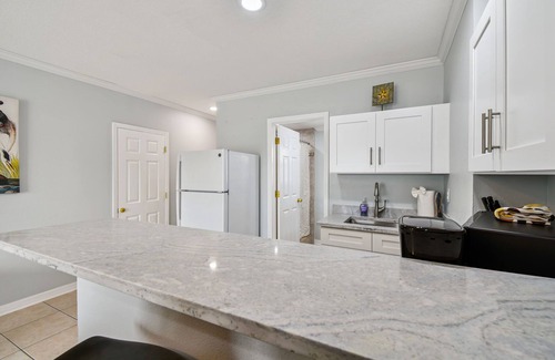 Bay Esplanade Apartment | Enchanted Inn Suite #2 w/View of the Intra-costal water-way Pool, Fishing Dock,